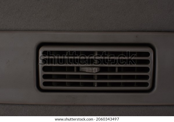 air conditioner in the car. Car\
air conditioner interior photo. AC vents to cool in the\
car.