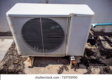 Air conditioner compressor unit installed on terrace of the building