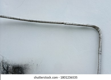 Air Conditioner Coolant Hose On Wall