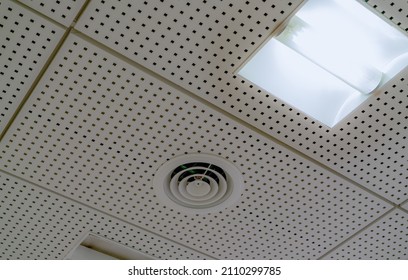 Air Conditioner. Air Duct And Ceiling Lamp Light Mount On Ceiling Of Hospital, Hotel, Or Office Building. Cool System In The Building. Air Flow And Ventilation System. AHU Air Conditioning System.