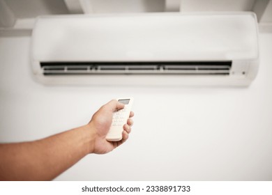 Air conditioner, hand and remote for electrical machine check with person in a home with ac repair. Maintenance, and system control for installation, inspection of aircon fix in house with contractor