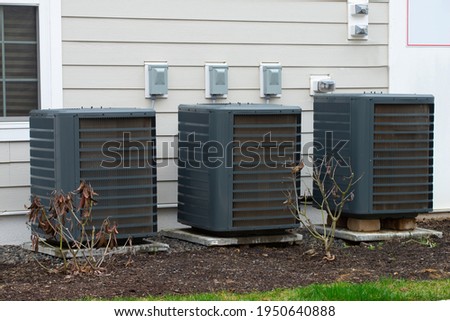 air conditioner near the house unit compressor cool fan pump