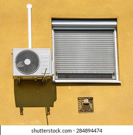 Air conditioner on the wall of a building