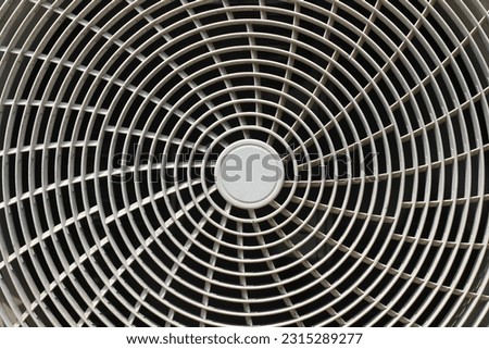 Air conditioning. the ac cover that forms a circular pattern. close up details