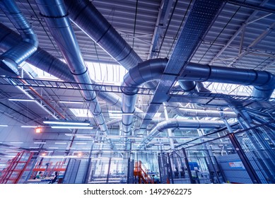 Air conditioning of buildings. Background of ventilation pipes. Laying of engineering networks. Industrial background