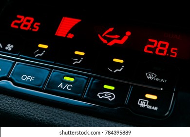 Air Conditioning Button Inside A Car. Climate Control AC Unit In The New Car. Modern Car Interior Details