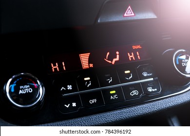 Air Conditioning Button Inside A Car. Climate Control AC Unit In The New Car. Modern Car Interior Details