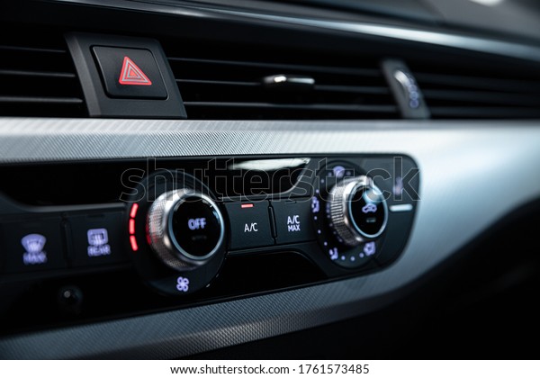 Air
conditioning control panel in car. Car
interior