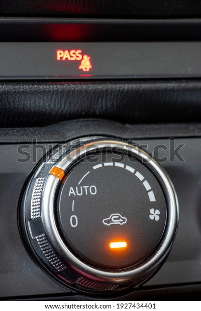 Air conditioning controls on the car dashboard.\
Close up car ventilation system, details of controls of modern\
car.