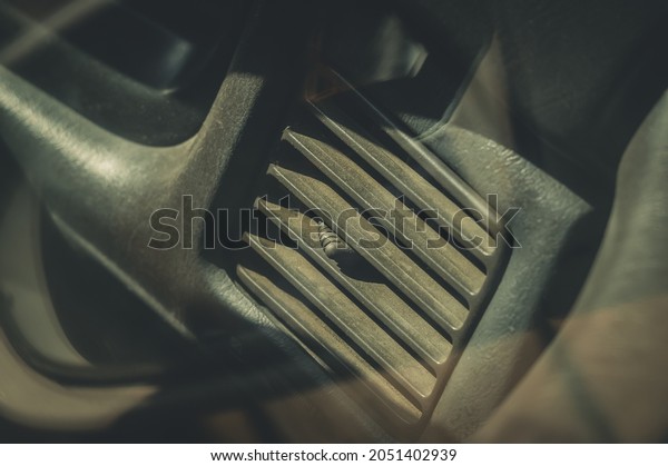 Air conditioning grille in the interior of an old\
car. Element of the dashboard of the car. Dust and dirt on\
surfaces. A look through the\
glass.