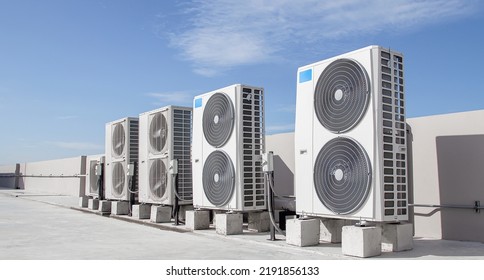 Air conditioning (HVAC) installed on the roof of industrial buildings. - Shutterstock ID 2191856133