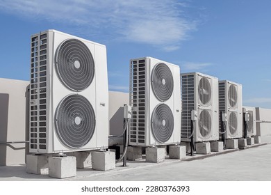 Air conditioning (HVAC) installed on the roof of industrial buildings.