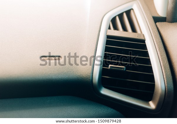 Air\
conditioning outlet from modern car\
interior