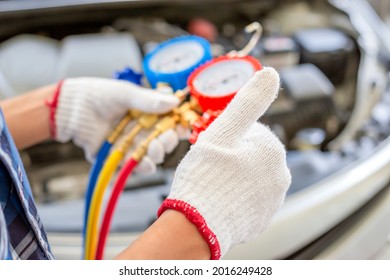 Air Conditioning Repair, Repairman Giving Thumbs Up And Holding Monitor Tool To Check And Fixed Car Air Conditioner System, Technician Check Car Air Conditioning System Refrigerant Recharge