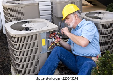Air Conditioning Repairman At Work