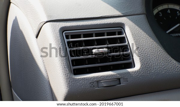 An Air Conditioning\
Vent in a Vehicle