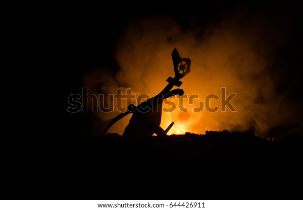 Air Crash. Burning\
falling helicopter. Destroyed helicopter. Decorated with toy at\
dark fire background
