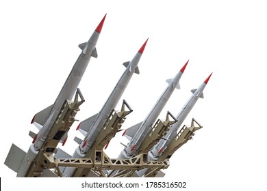 Air defense missile launcher complex. Four rockets earth-air ready for launch. Isolated on white background.
