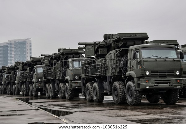 Air defense missile-gun system. The\
machines are wet from the rain. The photo was taken after the\
military parade on the Victory Day in Moscow. 9 May\
2012