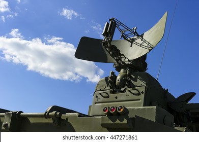 Air Defense Radar Of Military Mobile Mighty Missile Launcher System Of Green Color, Modern Army Industry, White Cloud And Blue Sky On Background 