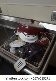 Air Drying Dishes On A Rack.