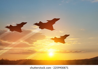 Air Force Day. Aircraft silhouettes on background of sunset or sunrise.
