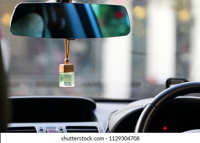 Air Freshener On Dashboard Of Car.