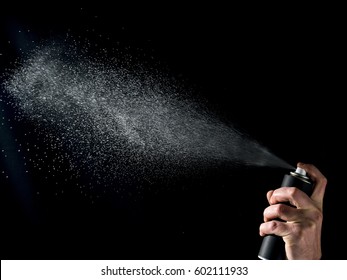 Air Freshener Spray In Front Of Black Background