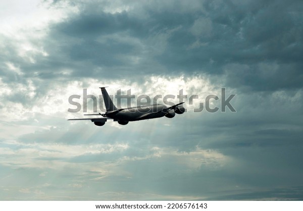 Air\
Froce fuel tanker airplane takes off into the\
sky