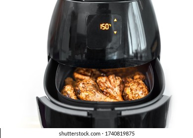 Air fryer, healthy cooking without oil, kitchen fryer on white background - Shutterstock ID 1740819875