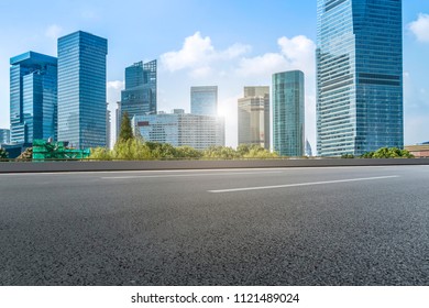 Air highway asphalt road and office building of commercial build - Shutterstock ID 1121489024
