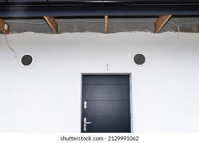 Air Intake And Exhaust In The Wall Of A Single Family House For Mechanical Ventilation With Heat Recovery, Secured With A Metal Grill With Mesh.