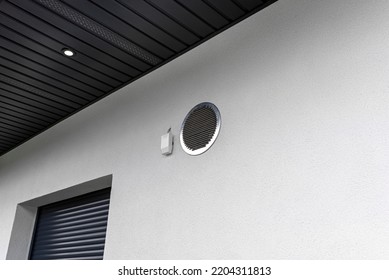 Air Intake And Exhaust In The Wall Of A Single Family House For Mechanical Ventilation With Heat Recovery, Secured With A Metal Grill With Mesh.