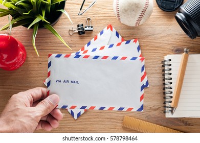 Air Mail Envelope On The Wood Table