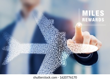 Air miles rewards with person touching airplane shape, frequent flyer loyalty program to earn points and bonuses for travel benefits like elite cards, airport lounge, business or first class flights