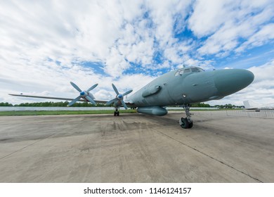 Air Military Plane Of Radio Electronic Reconnaissance Standing At The Airbase. Airplane With Four Turboprop Engines. Aviation Mission Of Military Flight.