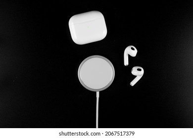 Air Pods 3. Air Pods 2021. with Wireless Charging Case. Magsafe. New Airpods on black background. Airpods 3 .EarPods. 
