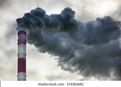 Air pollution, closeup of one big smoking pipe - Shutterstock ID 576303682