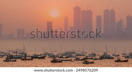 Air pollution concept - Modern highrise rich buildings and poor slums at sunset - Mumbai, india 
