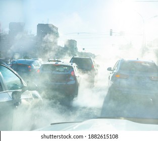 Air Pollution From The Exhaust Of Cars In The City During The Cold Day, Environmental Pollution In The City