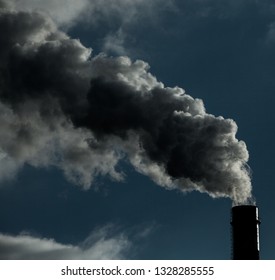 Air pollution. Harmful emissions. Bad ecology. Smoke from factory pipe
Dirty smoke on the sky, ecology problems.

