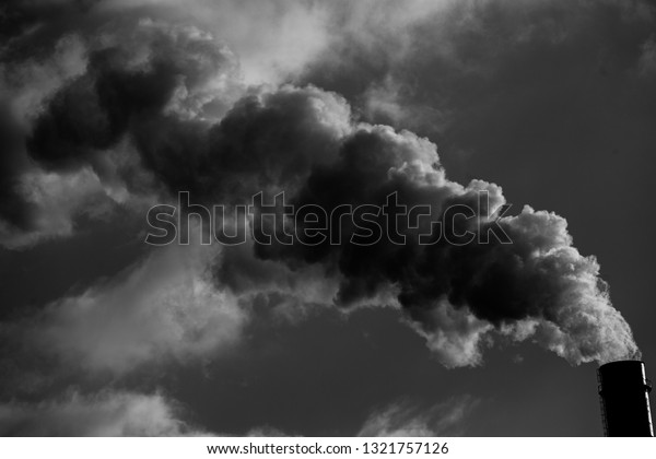 Air\
pollution. Harmful emissions. Bad ecology. Smoke from factory\
pipe\
Dirty smoke on the sky, ecology\
problems.\
