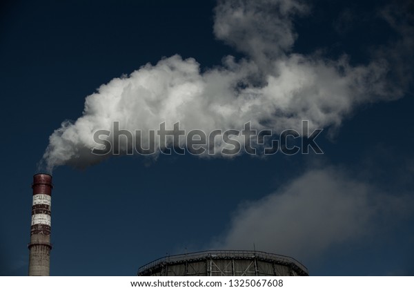 Air\
pollution. Harmful emissions. Bad ecology. Smoke from factory\
pipe\
Dirty smoke on the sky, ecology\
problems