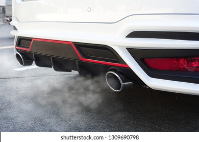 Air Pollution Particulate Matter Of 2.5 Microns Or Less In Diameter (PM 2.5)  From  Exhaust White Car