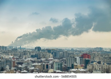 Air pollution. Power plant Polluting factory close to a city. Tilt-shift lens.