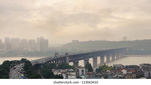 Air Pollution And Traffic On Bridge Number 1, The First Bridge Over The Yangzi River In Wuhan, Hubei Province, China