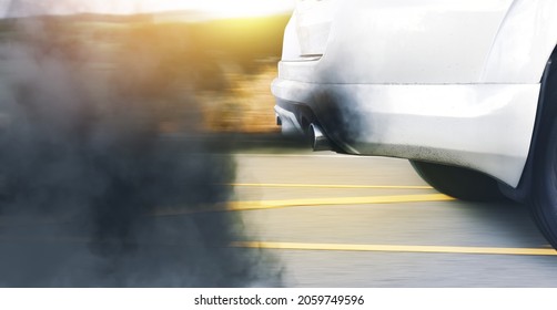 Air Pollution From A Vehicle With An Outdated Diesel Engine And Black Smoke On The Road