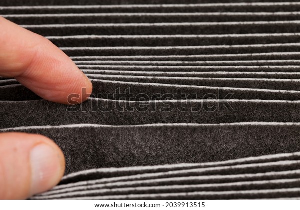 air purification filter is\
completely dirty, the old used completely dirty filter is\
black
