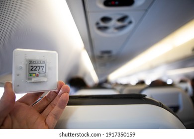 Air quality sensor CO₂ How clean is the air on planes. Healthy environment in airlines air monitor proper ventilation in your environment. CO₂ levels airflow for passengers travel virus levels