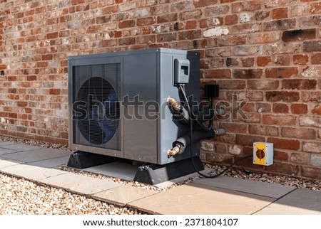 Air Source heat pump fitted outside a new home